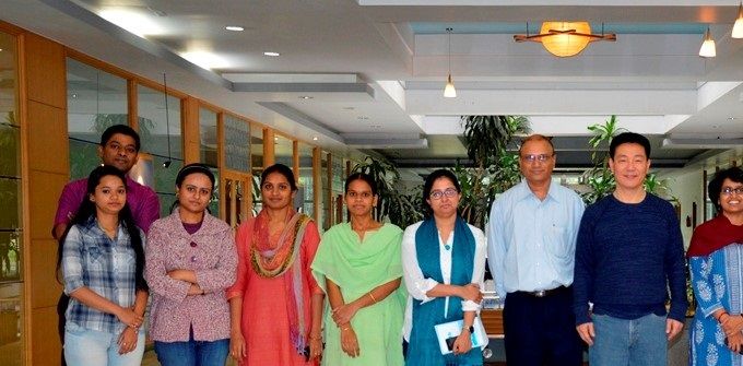 With faculty members at International Institute of Information Technology in Bangalore, India
